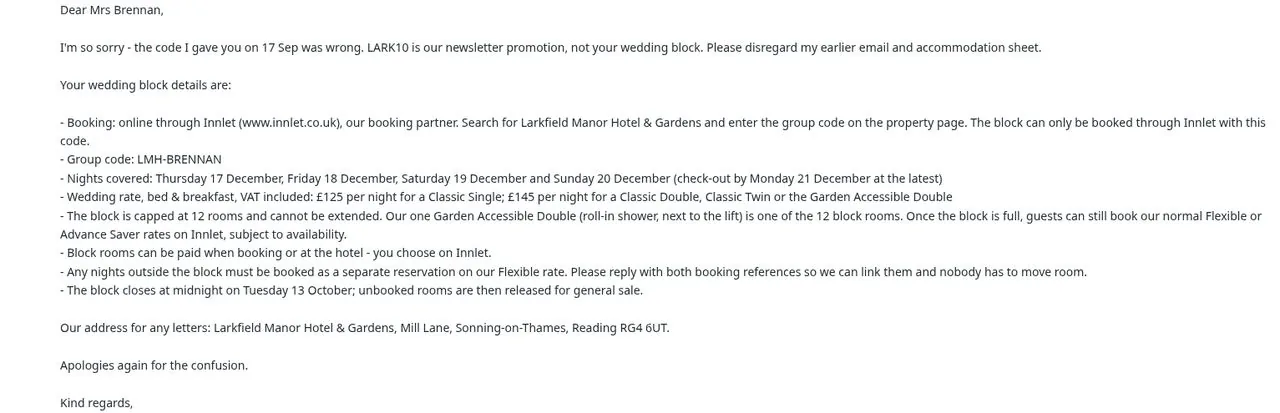 Zoomed view of the correction email from Priya at Larkfield Manor, the hotel holding the wedding room block. The group code is LMH-BRENNAN for the nights of Thursday 17 to Sunday 20 December, at £125 a night for a single or £145 a night for a double, twin or accessible room. The 12-room block cannot be extended. Any night outside it needs a separate Flexible booking, and both booking references must be sent to her so the hotel can link them.